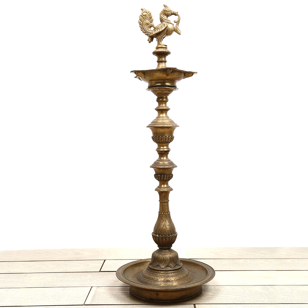 Long Brass Oil Lamp with Peacock Design.