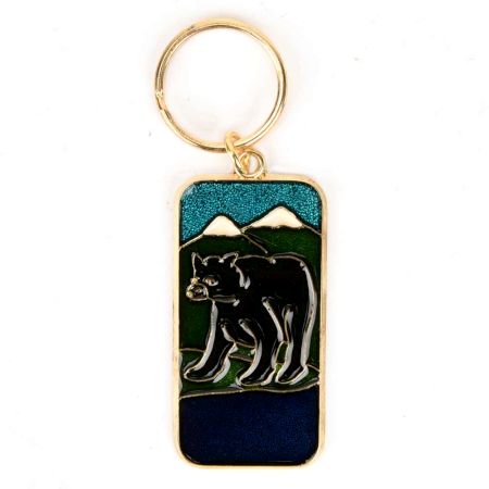 Black Bear In Forest Brass Key Chain With Snow Clad Mountain