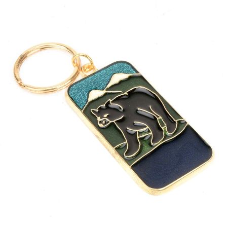 Black Bear In Forest Brass Key Chain With Snow Clad Mountain