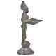 Bronze Lady Holding A Diya In Her Hand Is On A Raised Platform With Patina