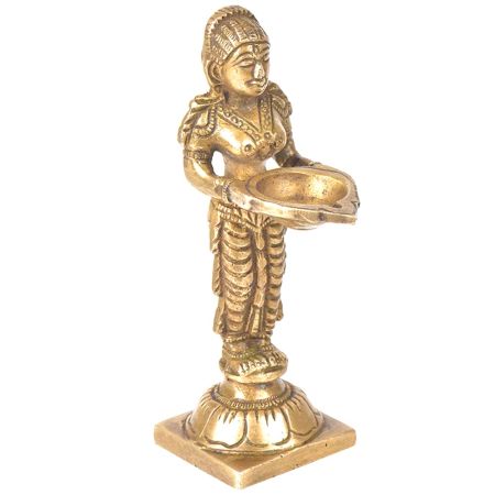 Brass Lady Standing On A Raised Platform Holding A Diya