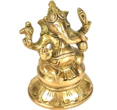 Brass Ganesha Sitting On A Raised Platform
