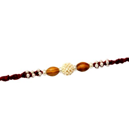 Handcrafted Rakhi with Pearls and Sandalwood Beads
