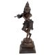 Lord Krishna statue playing a flute