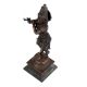 Lord Krishna statue playing a flute