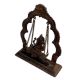 Brass Ganesha Sitting On Swing With Decorative Prabhavali