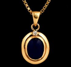 Single Oval Blue Sapphire Stone 18 K Gold Pendant With Diamond On Top