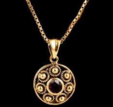 Gold Pendant Red Garnet Stone With Round Embossed Design Border