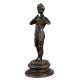 Brass Statue Of Boy Playing Flute