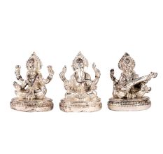 Copper Idols Of Goddess Saraswati Lakshmi and Lord Ganesh In Silver Finish