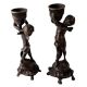 Pair Of 2 Brass Cherub Candlesticks