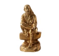 Brass Statue Of Shri Sai Baba Sitting On Stone