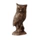 Brass Owl  Statue Perched On Top Of A Wooden Branch
