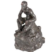 Modern Art Coal Mine Worker Sitting on Stone