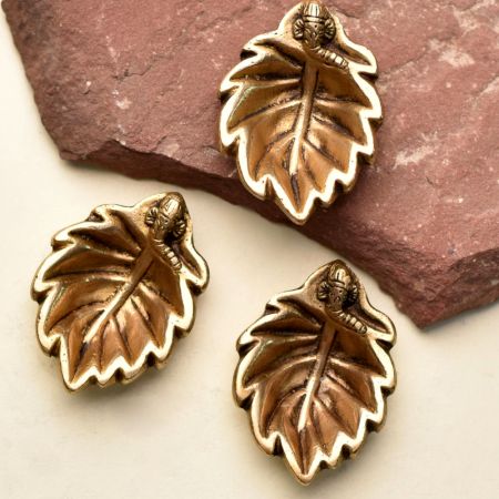 Brass Ganpati And Leaf Shape Diwali Diya Pack of 3 Diyas