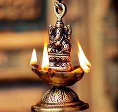 Brass Ganesha Figurine Hanging Four Wick Diya With Thick Chain
