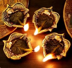 Handmade Golden Aluminium Ganpati on Leaf Shape Diwali Diya