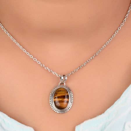 92.5 Sterling Silver Pendant Studded With Big Oval Tiger Eye Stone Decorative Border