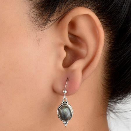 92.5 Sterling Silver Earrings Studded With Round Citrine In Holy Cross Design