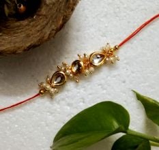 Traditional Rakhi with Kundan Beads, Acrylic, Metal, Wooden