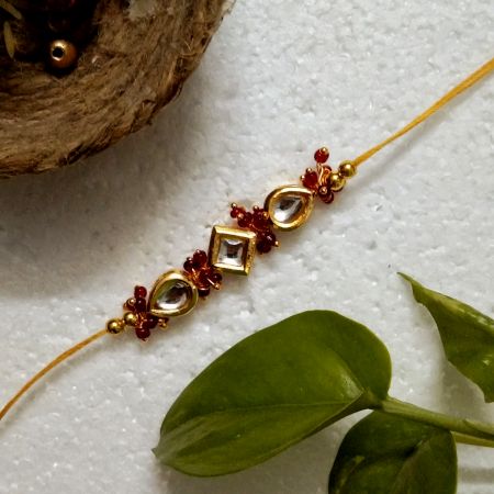 Traditional Rakhi with Wooden, Kundan Beads, Metal, Acrylic