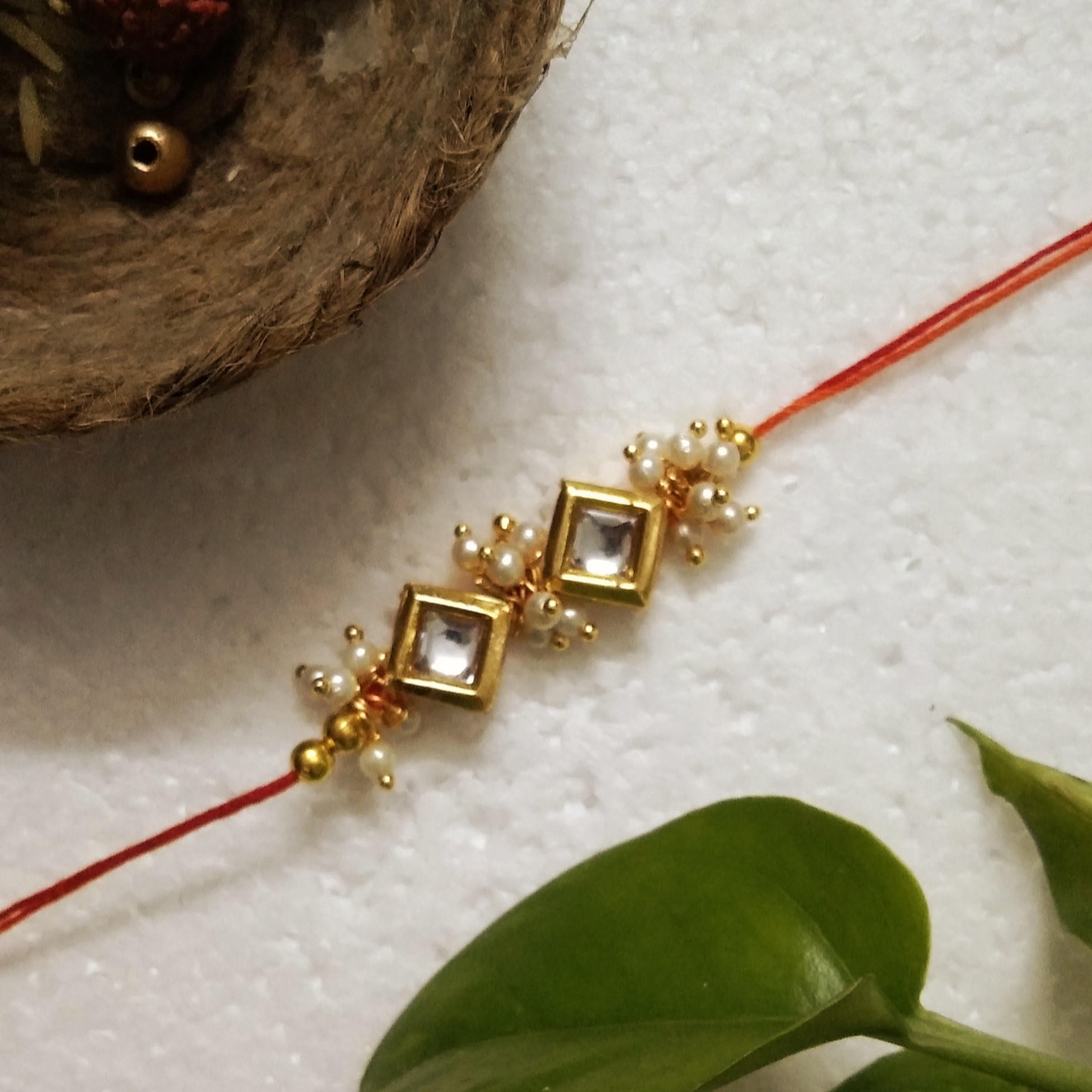 Traditional Rakhi with Wooden, Metal, Kundan Beads, Acrylic