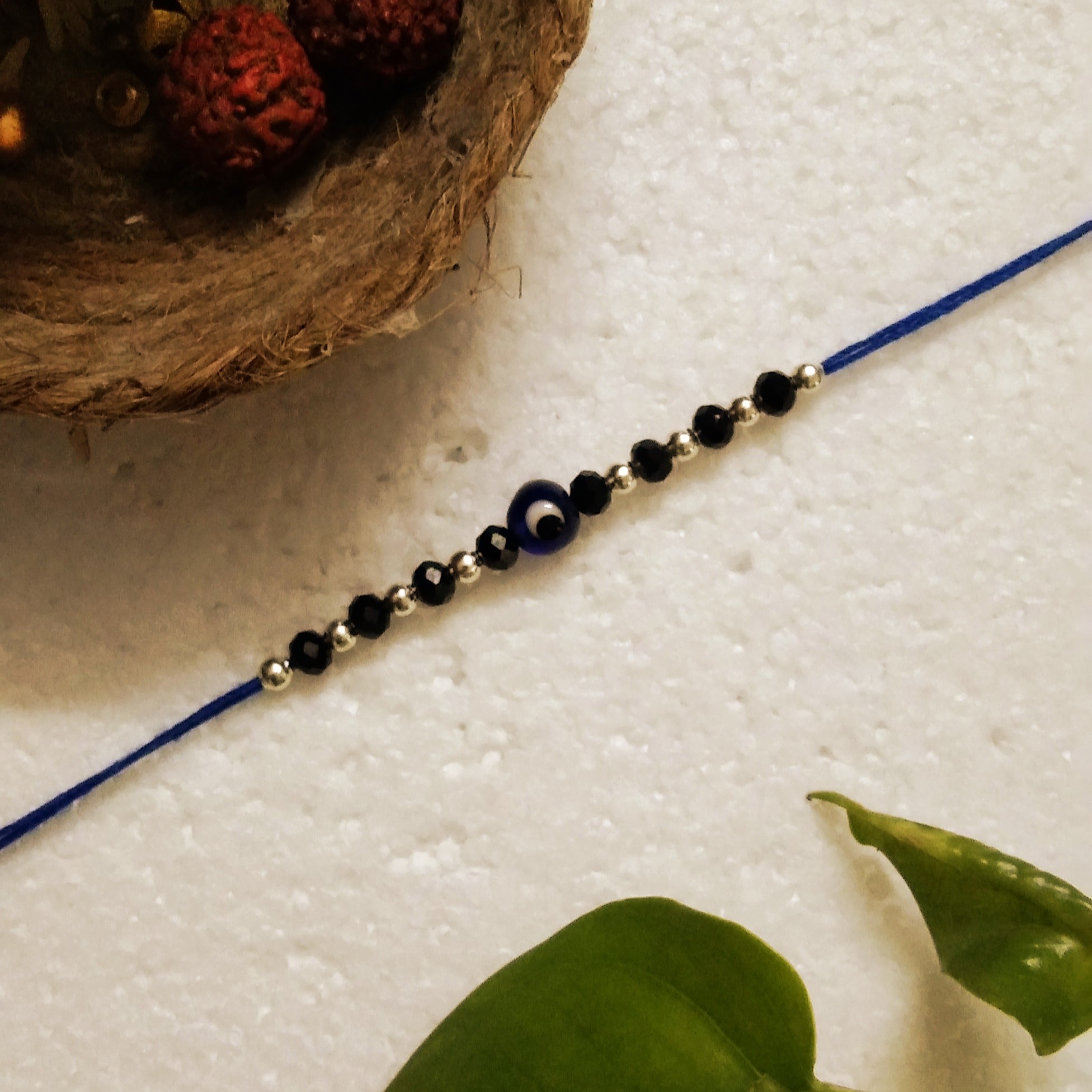 Classic Handmade Rakhi: Glass, Acrylic Beads Style