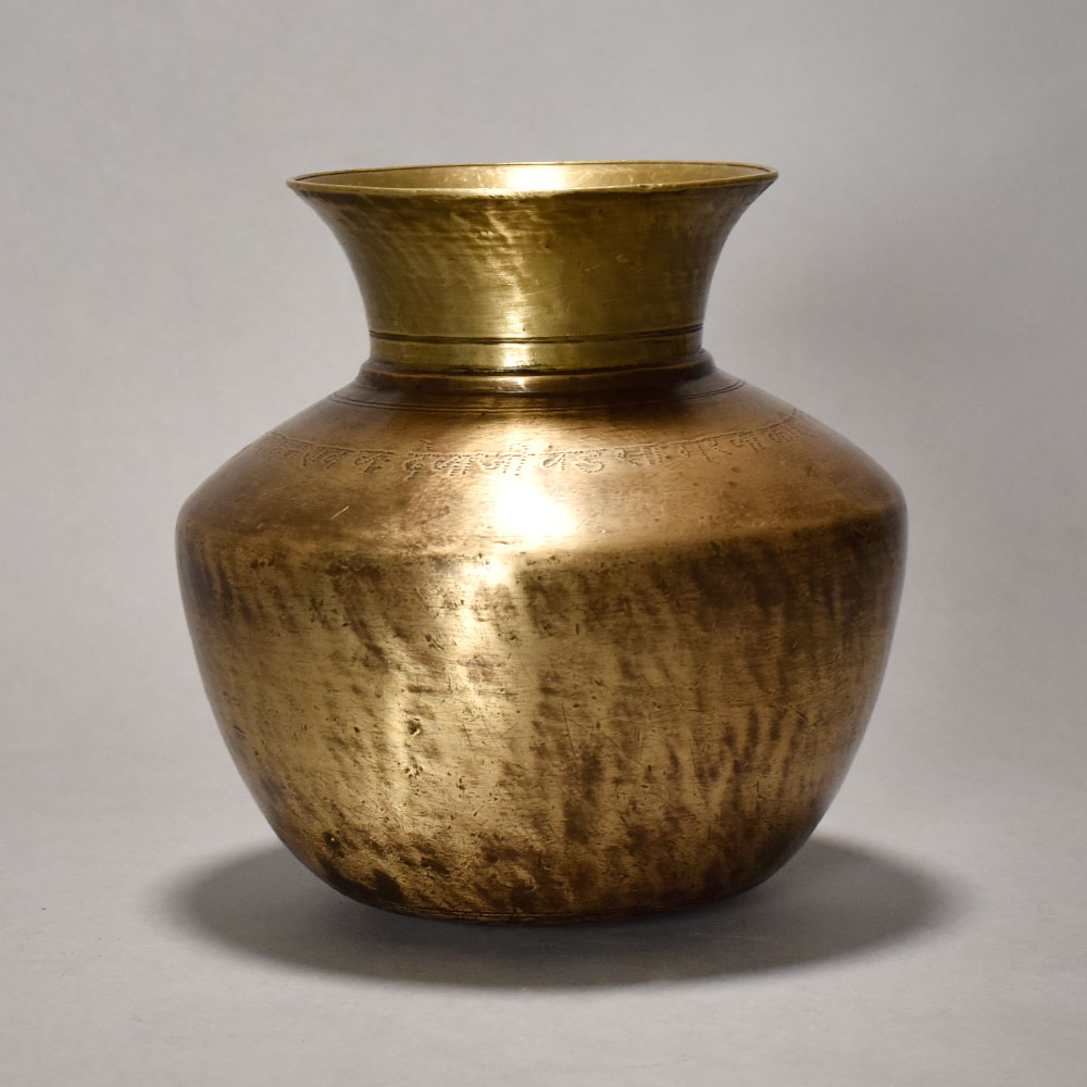 A Pure Holy Water Pot In Plain Design