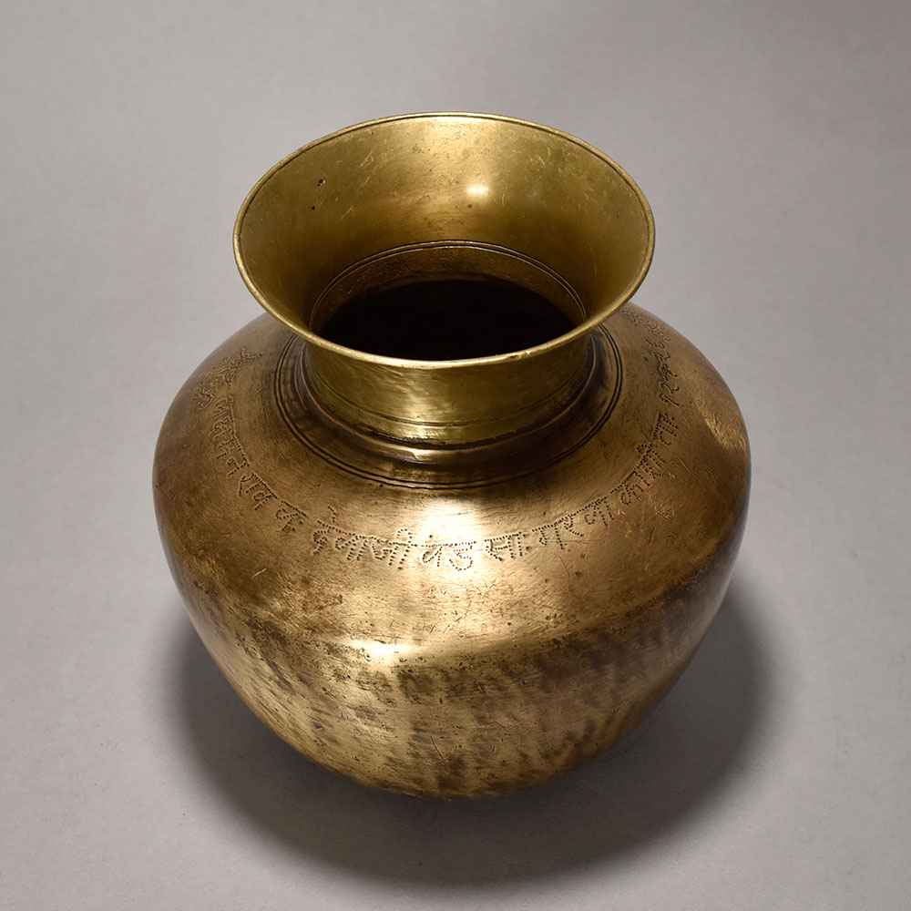 A Pure Holy Water Pot In Plain Design