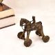 Handmade Vintage Brass Statue of Horse with Rider on Wheels
