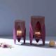 Heather-Toned Iron Candle Stand with Leaf Motif