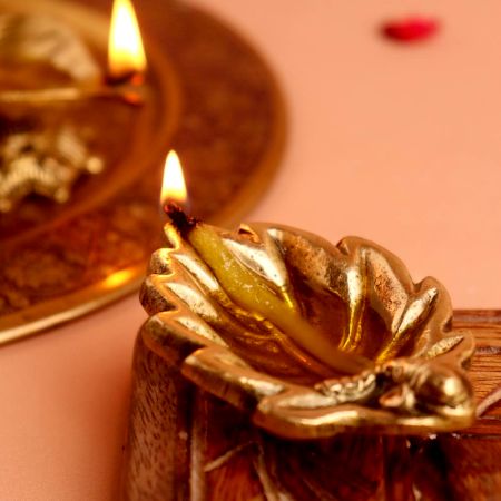 Brass Ganpati And Leaf Oil Lamp Diya