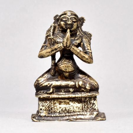 Male God Figure Sitting with Axe
