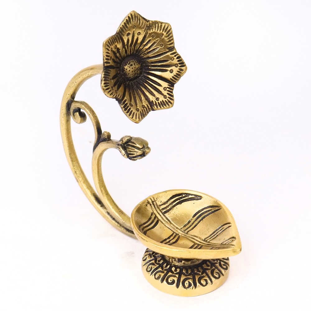 Brass Diya With Flower On Top