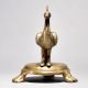 Brass Peacock Figurine on Table