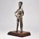 Handcrafted Vintage Soldier Figurine with Wooden Base