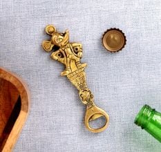 Brass Cartoon Character Bottle Opener On Tribal Floral Stand