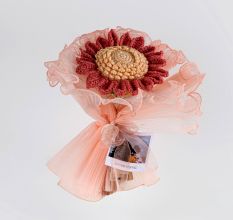 Wine Red Crochet Sunflower Wrapped In Peach Tulle