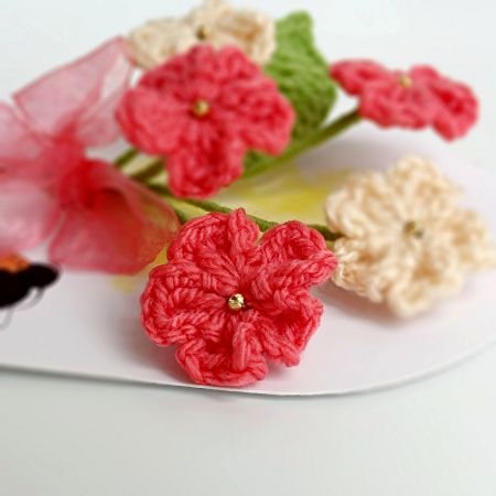 Layered Pink Crochet Flower With Delicate Leaves