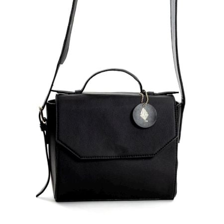 Elegant Vegan Leather Sling Bag With Silver Medallion Charm