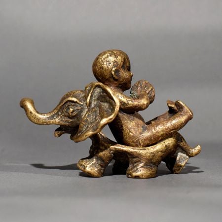 Vintage Brass Baby Riding Elephant Statue for Collection
