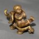 Vintage Brass Baby Riding Elephant Statue for Collection