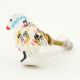 White Multicolored Feathered Bird Knob
