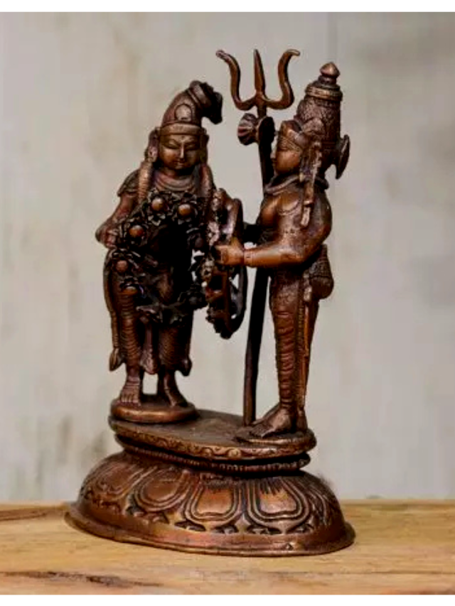 Who Wields the Crescent Moon and Holds the River Ganga?